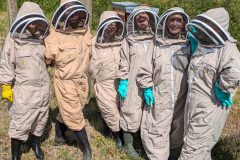 "All Suited Up and Ready to Buzz!"This team of beekeepers is fully geared up, excited to dive into a day of exploration and learning in the apiary.